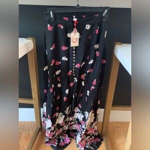 Anthro black floral skirt
